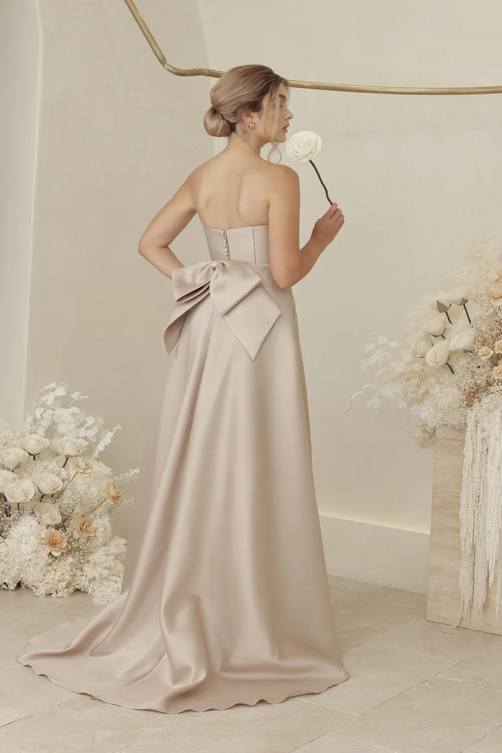 CAROLINE Strapless Curved Neckline Full Length Gown with Bow, Pockets and Covered Buttons (Tan Gazaar)
