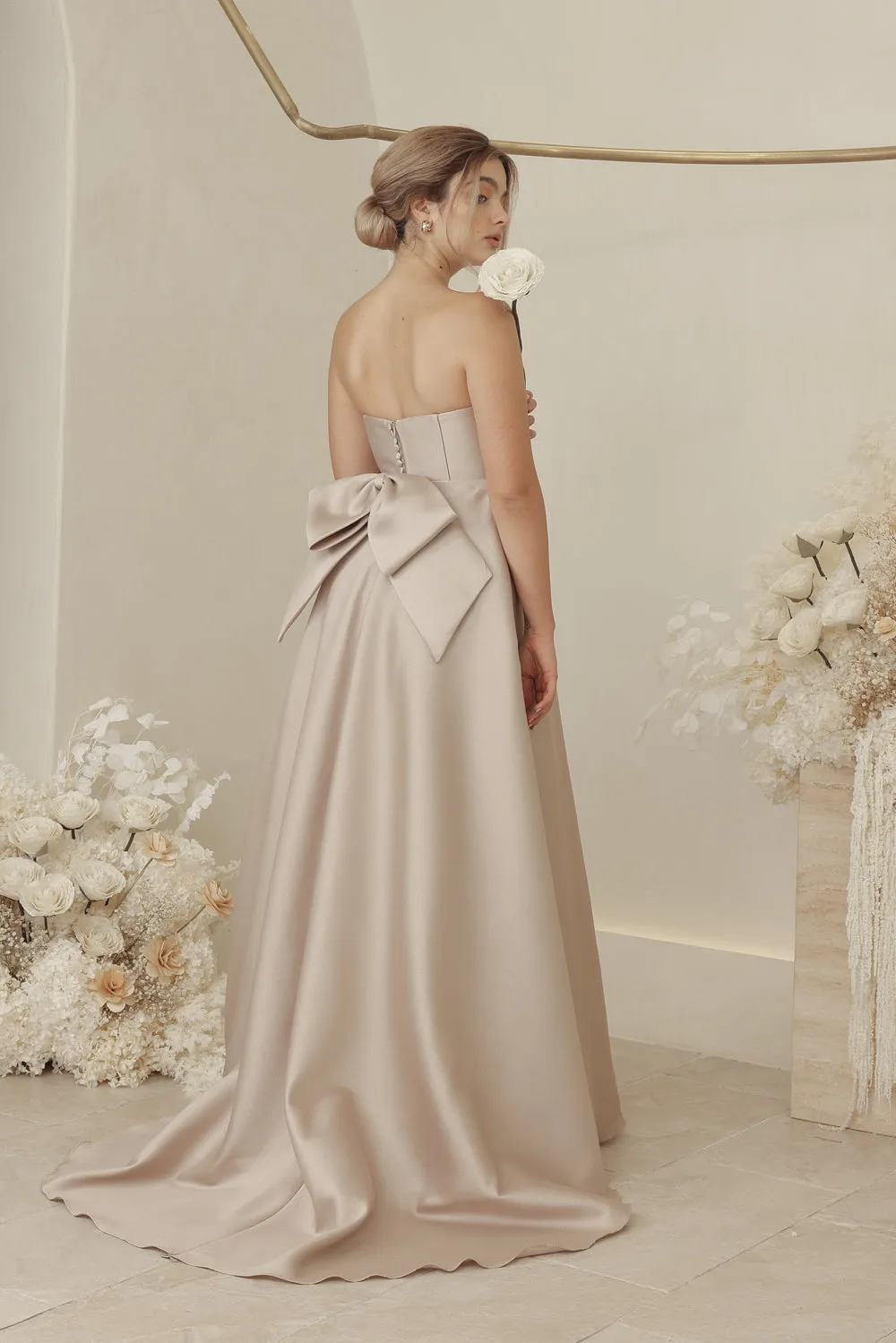 CAROLINE Strapless Curved Neckline Full Length Gown with Bow, Pockets and Covered Buttons (Tan Gazaar)