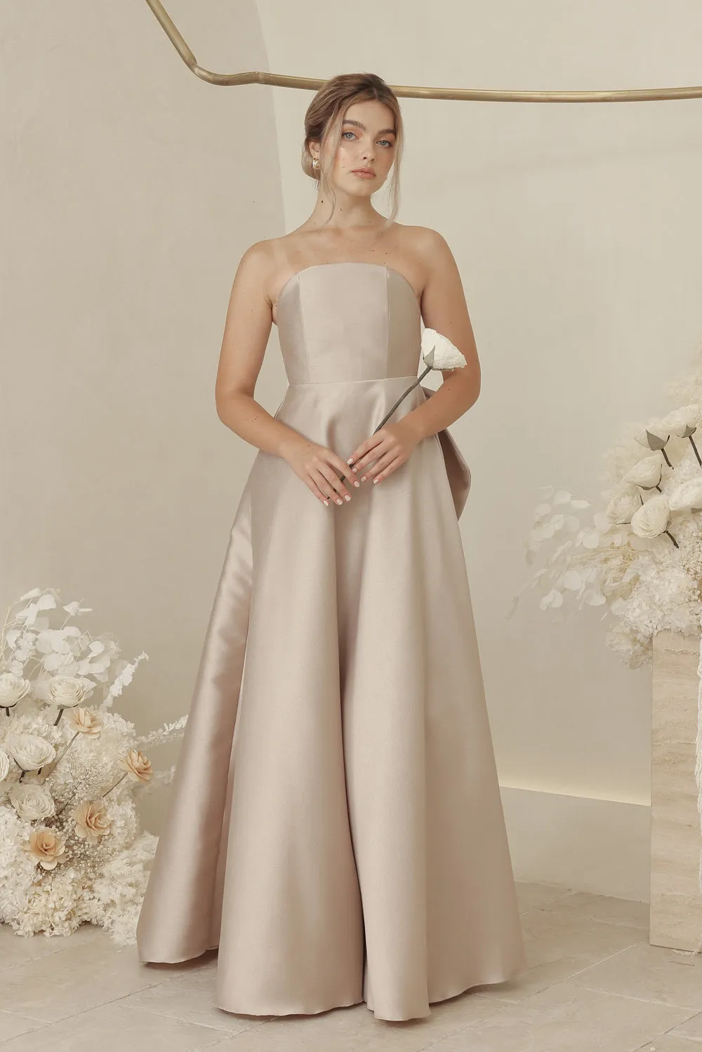 CAROLINE Strapless Curved Neckline Full Length Gown with Bow, Pockets and Covered Buttons (Tan Gazaar)